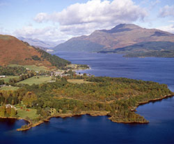 Luss regarding shores of Loch Lomond, with Ben Lomond beyond