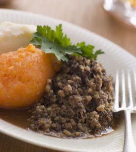 a plate of haggis, neeps and tatties
